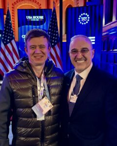 Vitaly Peretyachenko with Antonio Neri at the USA House during the Hewlett Packard Enterprise Champions of Innovation event at Davos 2026, discussing energy and infrastructure topics